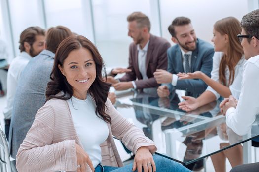 young business woman sitting at corporate business team meeting . the concept of teamwork