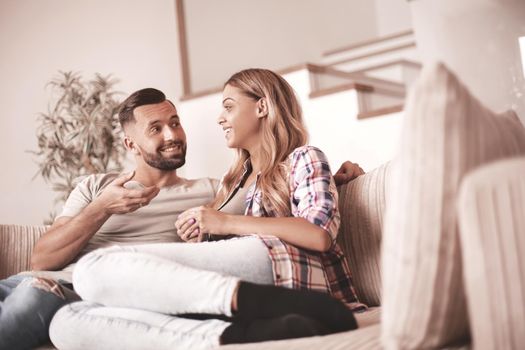 close up. loving couple relaxing on the couch on a free evening