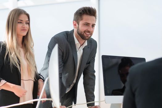 happy employees giving each other a high five. the concept of success.