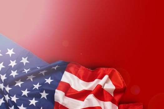 fragment of the flag of the United States on a red background.
