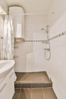 Modern shower stall in a bright bathroom