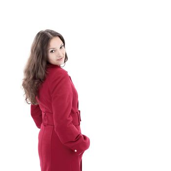 beautiful young woman in a red coat .isolated on white.photo with copy space