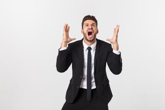 Businessman with long beard over isolated background shouting with mouth wide open.