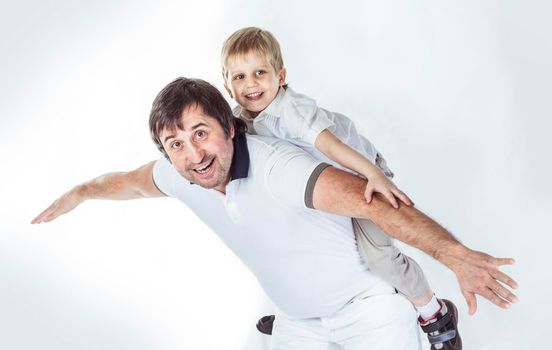 father and son.happy family.the upbringing of the child.the photo has a blank space for text