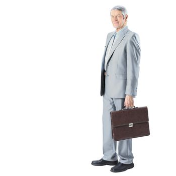 Nice businessman at the age, with a portfolio of. Isolated on a white background.