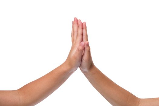 Kids real friendship pictures on white background. Close-up hands of child making hi-five gesture. Win and teamwork concept.