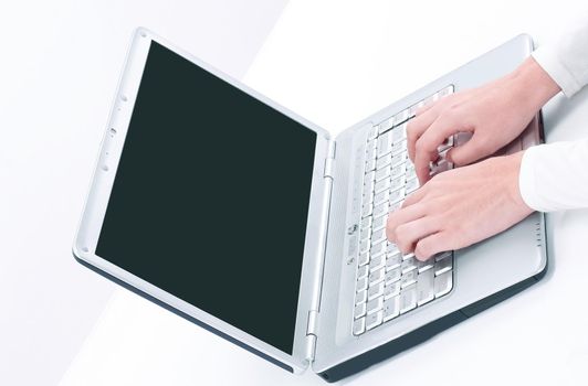 closeup.business woman typing on a laptop.isolated on white background