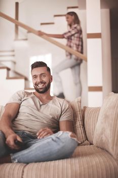 close up. young man sitting on sofa. photo with copy space