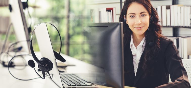 Business people wearing headset working in office to support remote customer or colleague. Call center, telemarketing, customer support agent provide service in broaden view .