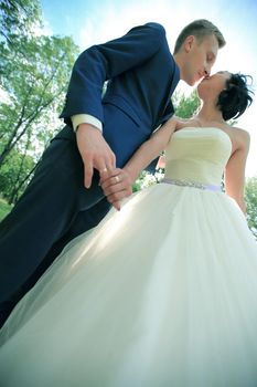 closeup. portrait of bride and groom kissing .outdoor
