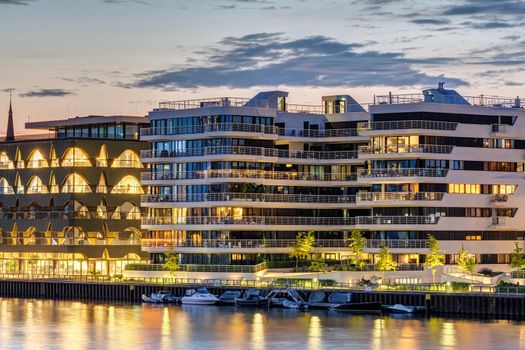 Luxury apartment buildings at the river Spree in Berlin at dusk