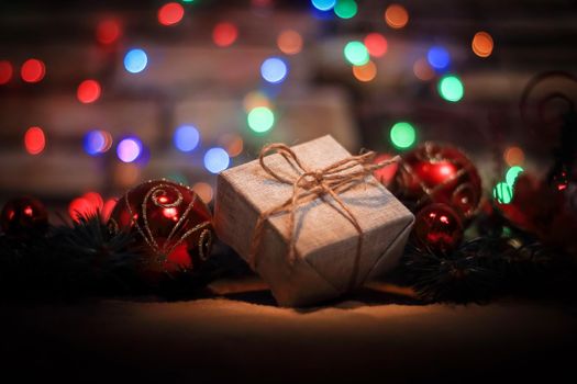 Christmas present on the background of Christmas lights.photo with copy space.