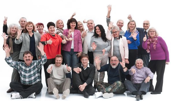 Group of happy elderly people standing and sitting isolated over a white