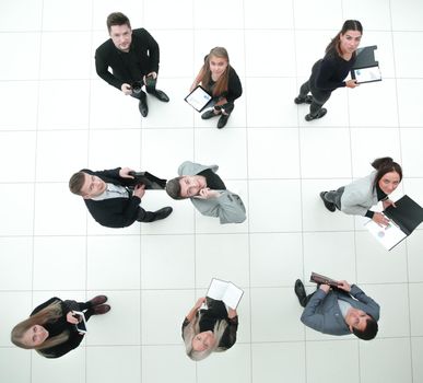 top view. group of serious diverse business people looking at the camera . business concept