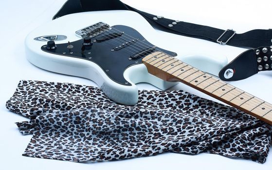 closeup.black electric guitar on white background. photo with copy space