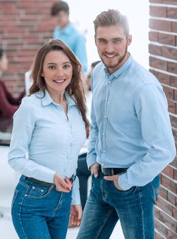 Smiling business people attending work meeting