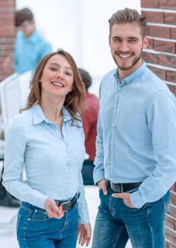 Smiling business people attending work meeting