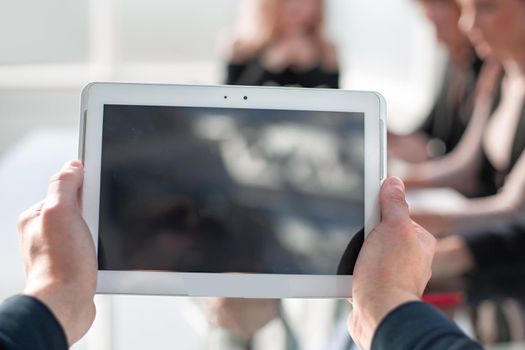 Businessman holding digital tablet