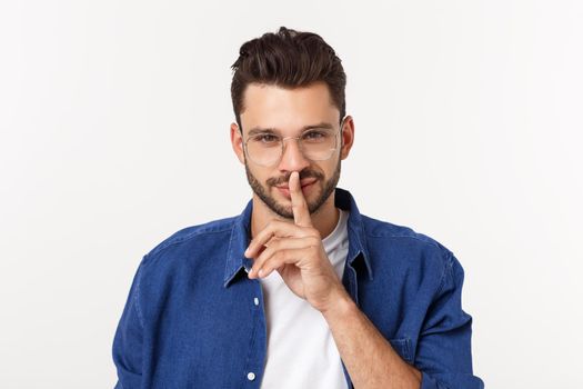 Charming handsome. Handsome young man in casual wear while standing isolated on white background.