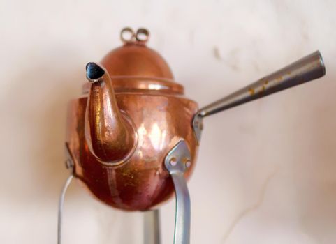 Copper coffee pots for home interior. Old copper kettle