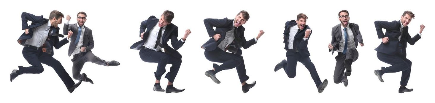 in full growth. two cheerful dancing business people. isolated on white background.