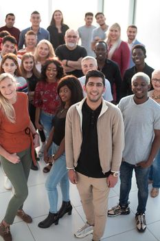 Group of multiethnic business people standing in the bright office