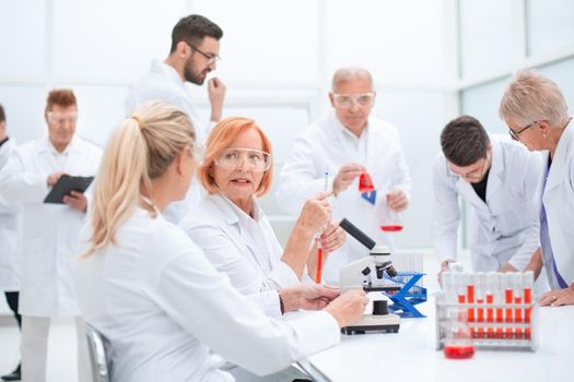 close up. group of doctors and scientists work in the laboratory.