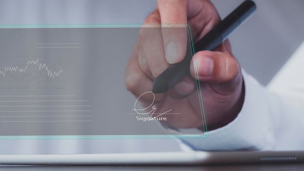 businessman use electronic pen sign signature on electronic  E-signing, data sheet document management, paperless office concept. Businessman using stylus pen signing e document on digital tablet.