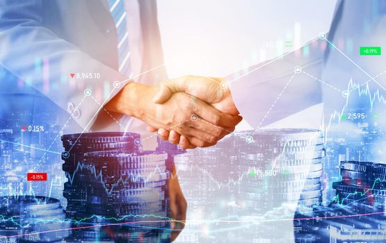 Business handshake on finance prosperity and money technology asset background . Economy and financial growth by investment in valuable stock market to gain wealth profit form currency trading