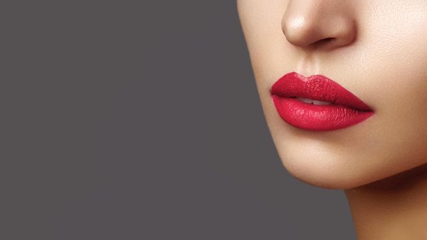 Beautiful Woman Lips with Fashion Lipstick Makeup. Cosmetic, Fashion Make-Up Concept. Beauty Lip Visage. Passionate kiss. Female Sexy Open Mouth