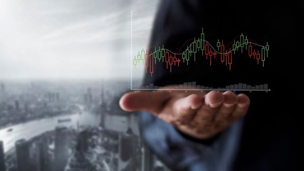 Businessman show stock market bar chart grow up to target. Business finance concept. Businessman's hands Show success graph, stocks grow every year 