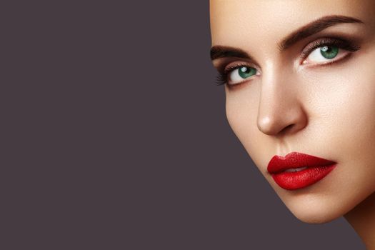 Beautiful Woman with Professional Makeup. Celebrate Style Lips Make-up, Perfect Eyebrows, Shine Skin. Bright Fashion Look.
