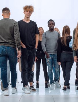 groups of diverse young men striding towards each other