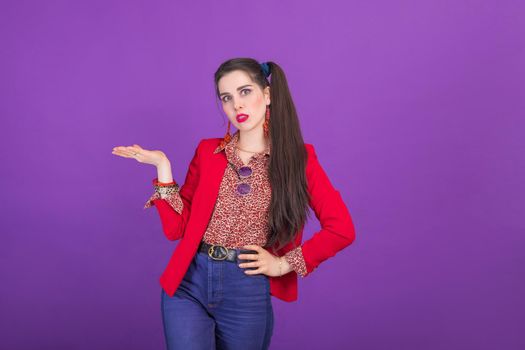 Retro fashion 90s 80s young woman in red jacket portrait, palm up gesture with copy space.