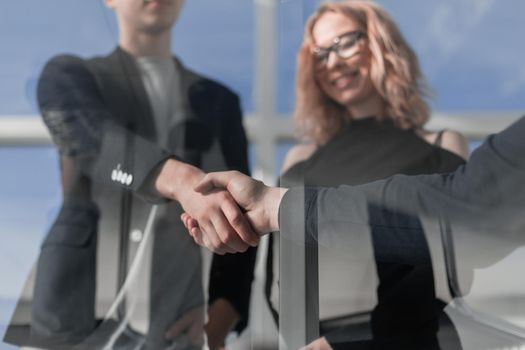 shaking hands while working for teamwork and cooperation concept after finish an agreement in the office construction site, success collaboration concept