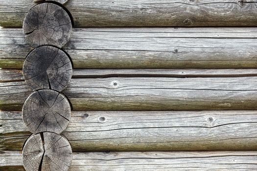 Old log wall. Texture of the wooden wall of an old house