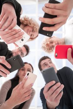 Group of businessman hold smartphones.