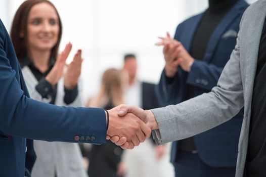 business people greeting each other with a handshake . concept of cooperation