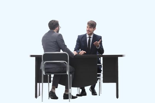 two business people talking sitting at a Desk. isolated on white background