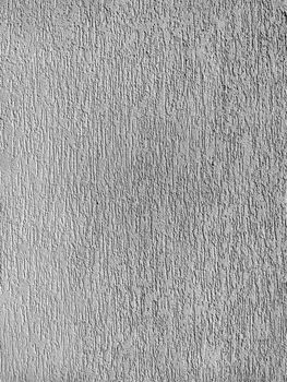 The texture of the plaster is bark beetle on the wall. Seamless grey texture.