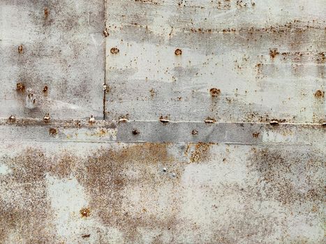 Rusty corrosion and oxidized background. Grunge rusted metal texture background. High resolution image of oxidized iron steel sheet wall.