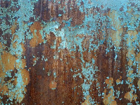 Corroded metal background. Rusted white painted metal wall. Rusty metal background with streaks of rust. Rust stains. The metal surface rusted spots. Rystycorrosion.