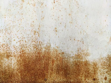 Rusty corrosion and oxidized background. Grunge rusted metal texture background. High resolution image of oxidized iron steel sheet wall.