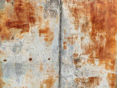 Rusty corrosion and oxidized background. Grunge rusted metal texture background. High resolution image of oxidized iron steel sheet wall.