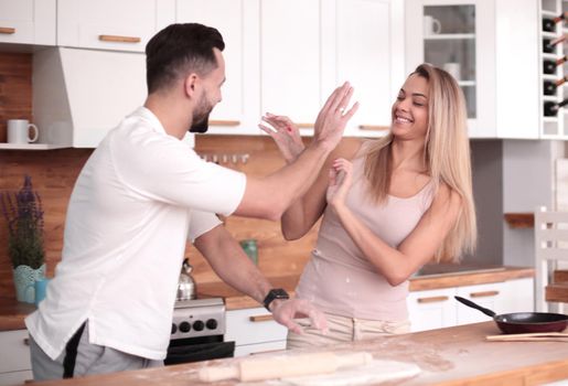 close up. a young couple communicates in the home kitchen