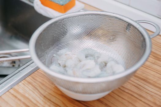 Preparing Sarsuella in a cooking mater class. Shrimp close-up. Cooking at home, home-cooked food.