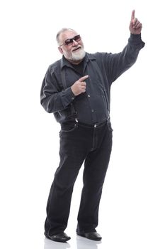 in full growth. confident older man pointing at you. isolated on a white background.