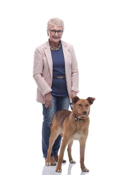 full- length . happy senior woman with her pet. isolated on a white background