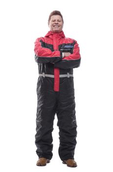 in full growth. happy man in winter insulated overalls. isolated on a white background