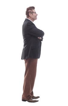 side view. smiling businessman looking ahead . isolated on a white background